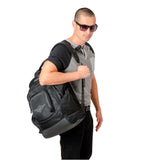 Guy wearing glasses and backpack