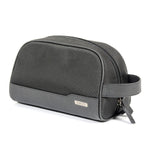 Black compact toiletry bag with leather trim